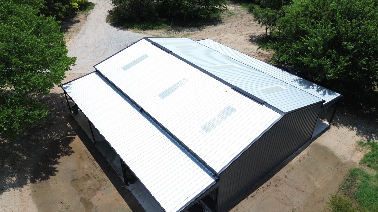 Metal roof on a finished steel building in North Texas, aerial view